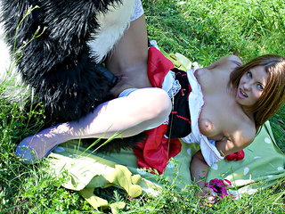 Red Riding Rubber hood pummeled outdoors