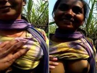 Desi Indian girl invites guy to caress her melons in public